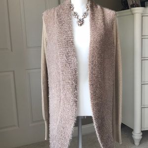 Women’s cardigan sweater by Vera Wang.